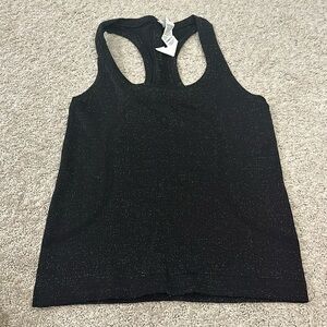 Excellent condition lululemon size 2 sparkly black racerback tank- race length.